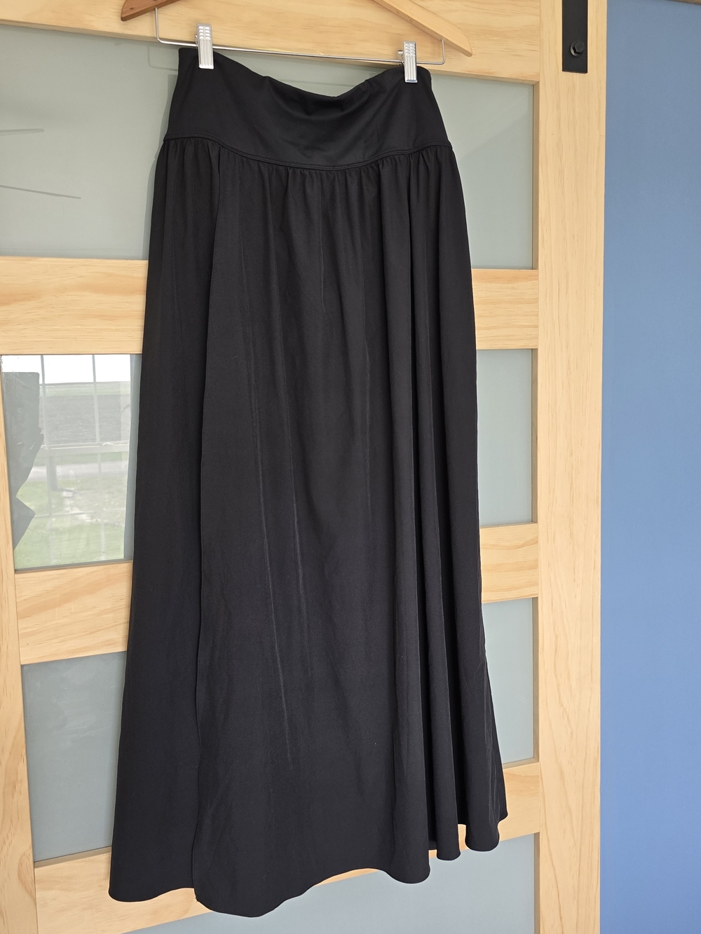 HALARA Black Flowing Maxi Skirt with High Waist